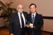 Dr. Nagib Callaos, General Chair, giving Professor Shigehiro Hashimoto an award "In Appreciation for Delivering a Great Keynote Address at a Plenary Session."